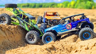 RC CARS Sand Storm Racing - 2 WlToys 10428 VS Axial Wraith