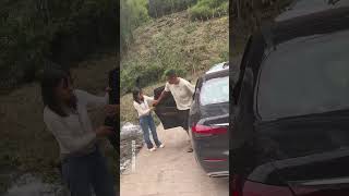 A couple fell into the river, and a kind-hearted person risked their life to rescue them.#RoadRescue
