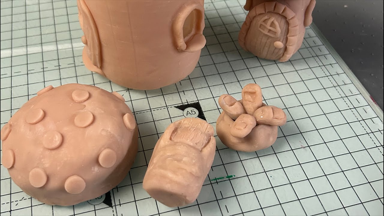 Clayart painting mushrooms and toes