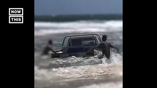 Swimmers Dodge Suv As It Crashes Into Water