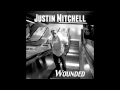 Wounded  justin mitchell music