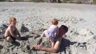 Burying Daddy In The Sand