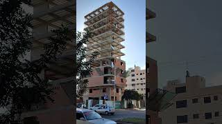 Construction Workers Lift Material Creatively