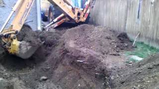 Digging a foundation with case 580 sl