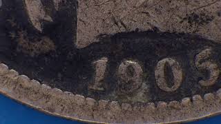 1 Silver Dime 'Barber Dime', form 1905, United States of America coin under microscope