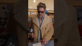 The cast of Sundance film The Musical draw popcorn buckets for their movie.