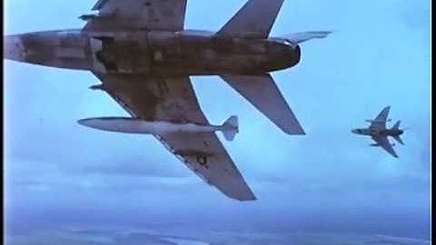 Army Forward Air Control performs F-100 air strikes