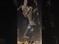 Halloween drone light show in Dubai with a giant skeleton moving eerily next to the Burj Khalifa