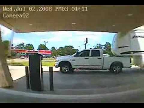 Trailer destroys banks drive thru