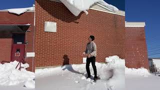 Jumping off roof into snow