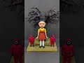 Soft Clay Bobbleheads Compete In 123 Wooden Man Against The Squid Game Doll mp3