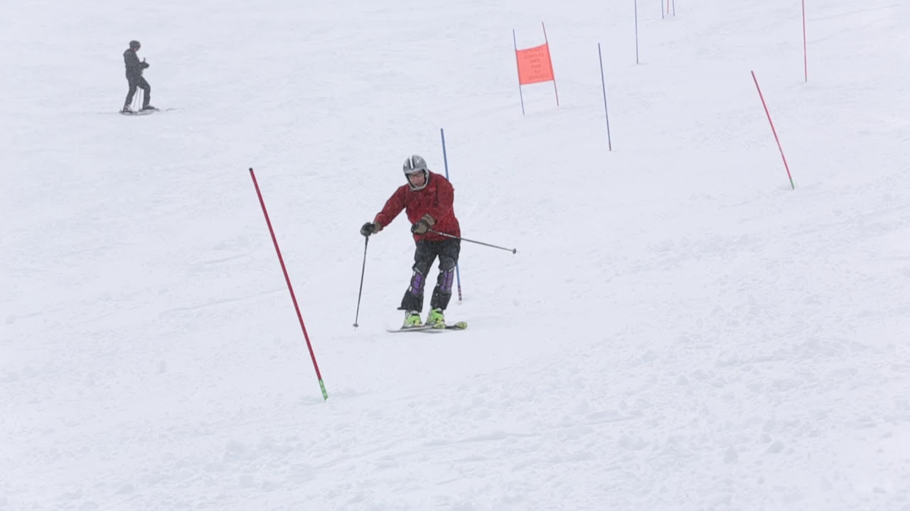 Person with Parkinson's disease skiing slalom, motor symptoms increase