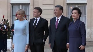 Chinese President Xi and his wife at Elysee Palace in Paris for state dinner