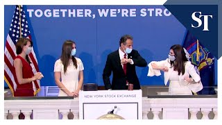 New york governor andrew cuomo joined traders in putting on a face
covering to mark the reopening of iconic stock exchange trading floor,
ano...