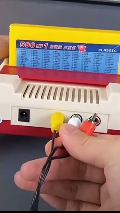 Famicom. Retro game console 90s