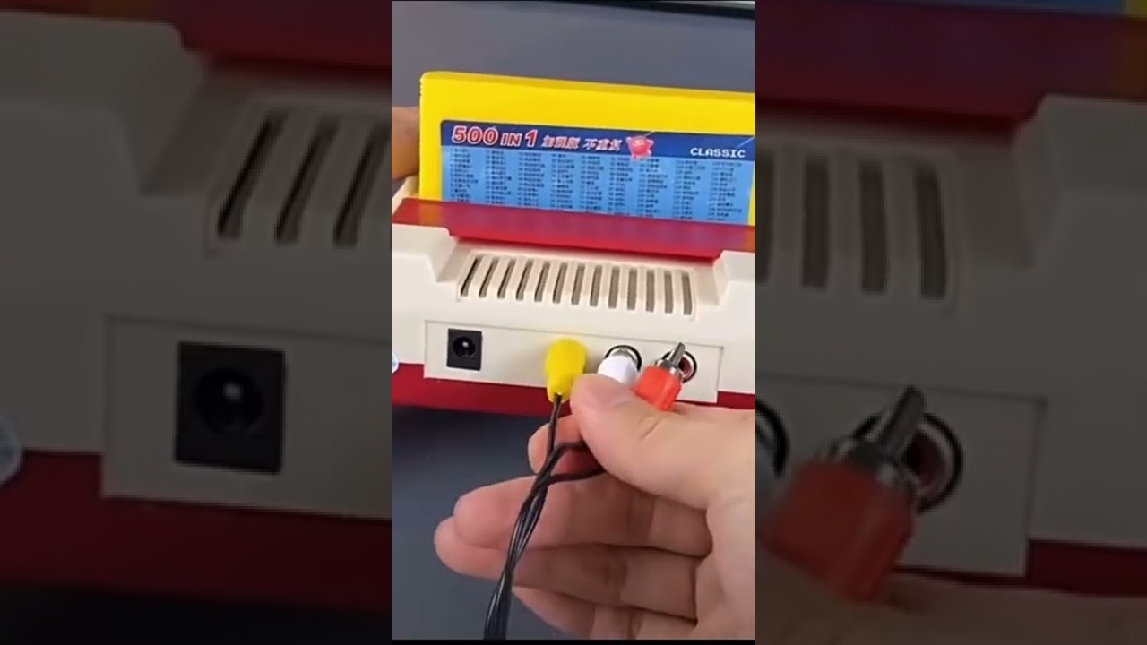 Famicom. Retro game console 90s Famicom. Retro game console 90s