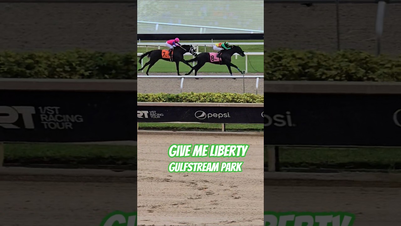 Give Me Liberty surges late to upset race 8, apprentice Elijah Greenidge up. 