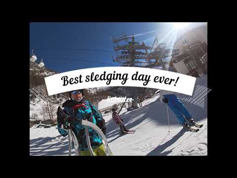 Sledging down a snowy street