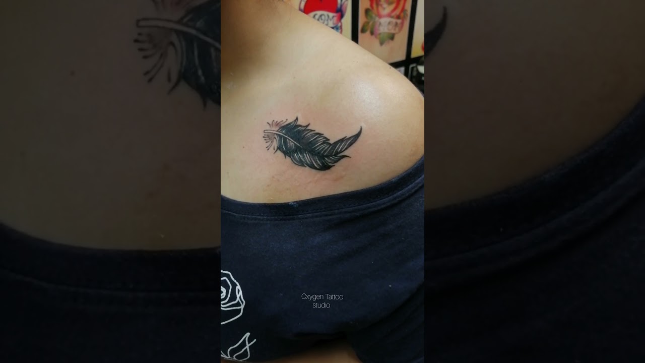 cover up old tattoo with the beautiful feather tattoo..@ Oxygen Tattoo studio, Indore M:9926083849