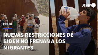 Migrantes continúan cruzando la frontera de EEUU pese a nuevas restricciones de Biden | AFP