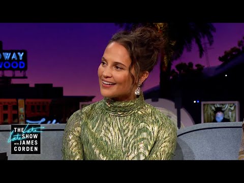 Alicia vikander loves being trackside for her husband's races