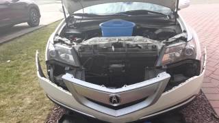 Acura MDX 2011 headlight  bulb replacement. Bumper remover instructions in video.