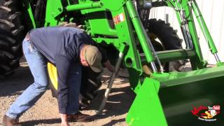 How To: Remove a John Deere 553 Loader