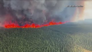 Hazardous smoke from wildfires hangs over millions in Canada, US