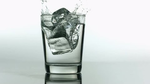 Slow Motion Ice Dropping into Water Glass | Video Footages | Slow Motion