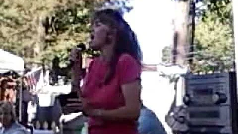 Brenda Kutzli singing at her birthday party