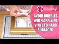 Appliquer du vinyle sur des surfaces dures sans bulles
