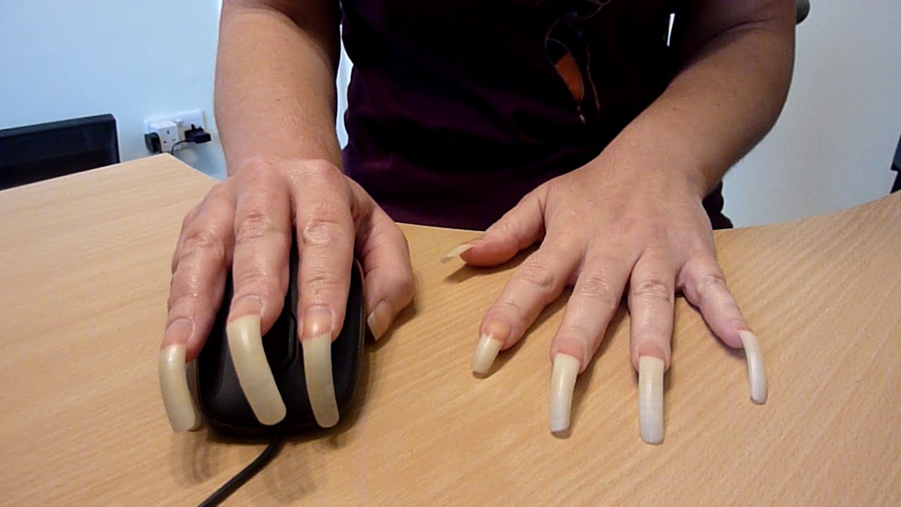 Problems with having real long natural nails! E.G. Operating a mouse and typing on a keyboard 😣