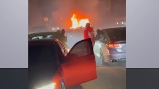 Car fire and couple attacked: Illegal street takeover turns violent in Queens | NBC New York