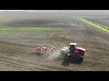 Fertilizing the soil - working on a tractor with discs