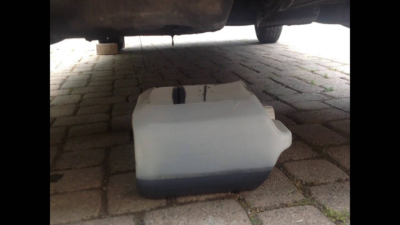 Comment faire une vidange d'huile sur une Peugeot 205 ? - YouTube