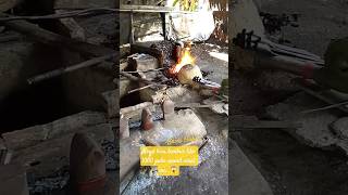 straightening the coil spring iron by pulling and hitting it #americanlife #medievalblacksmith #usa