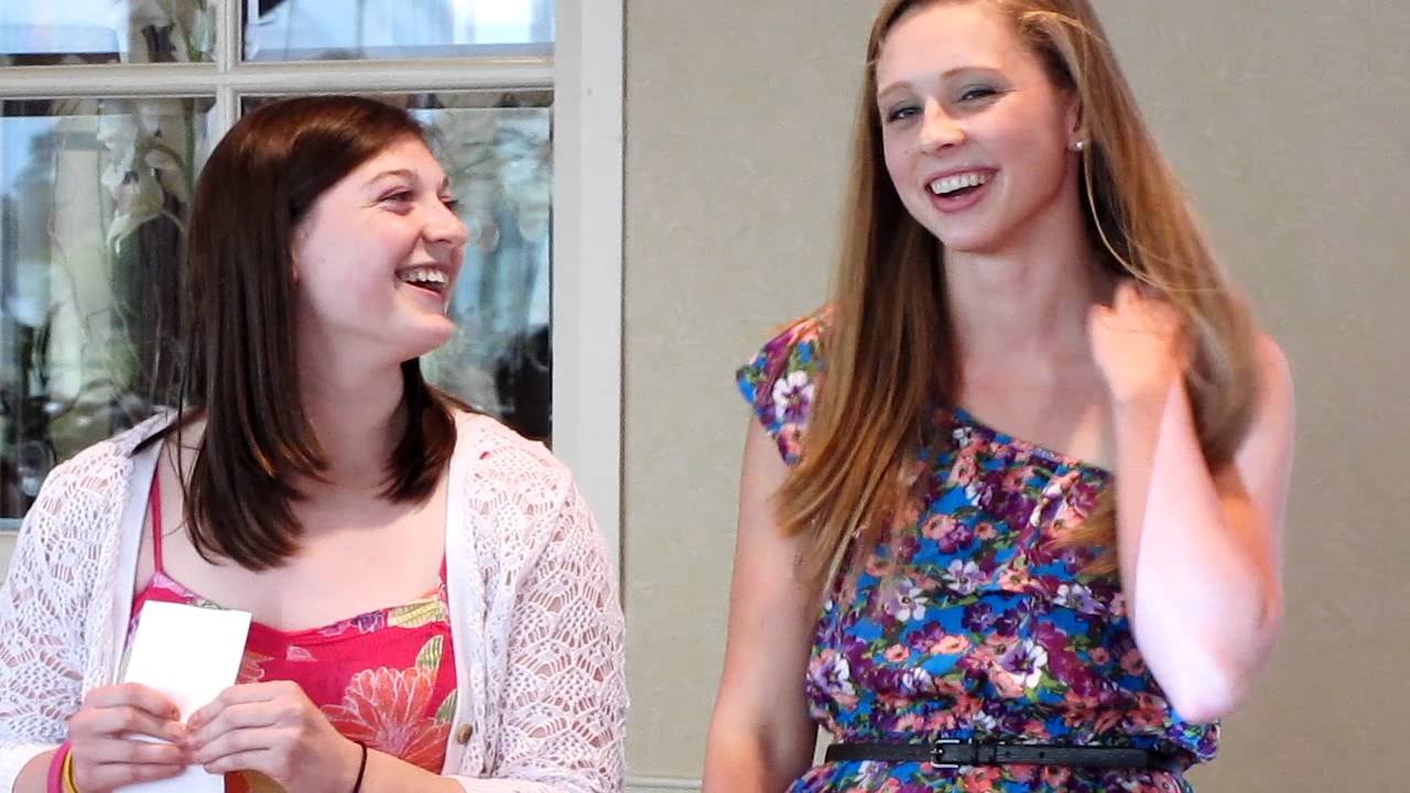 Graduating seniors, Maggie Cory and Elena Piper are honored at the TAC Swim...