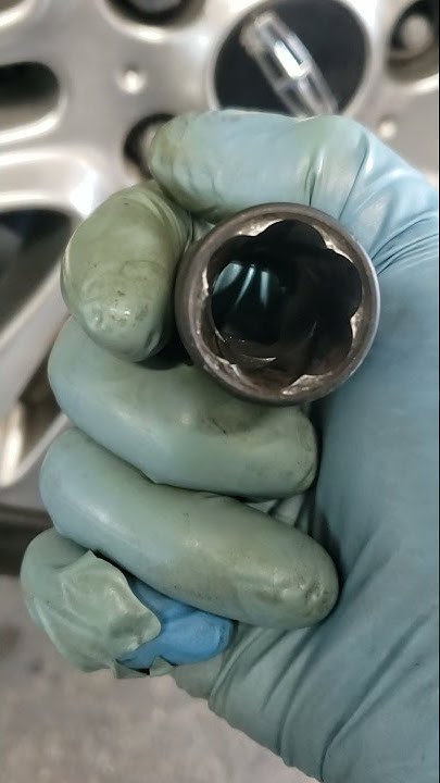 Rounded off lug nut removel - YouTube
