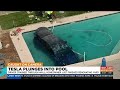 Tesla crashes through wall plunges into phoenix backyard pool