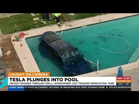 Tesla crashes through wall, plunges into Phoenix backyard pool