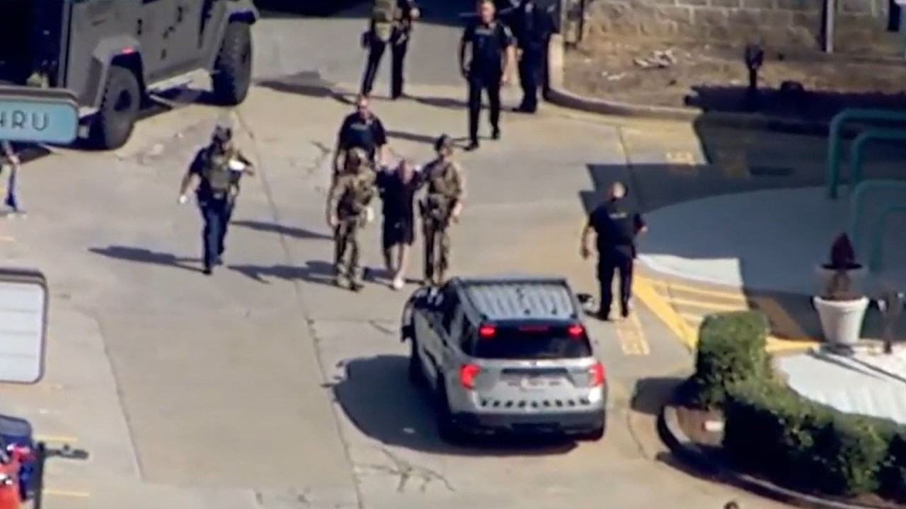 LIVE BREAKING NEWS: Heavy police presence shuts down major road in Woodstock