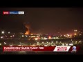 Firefighters are at the scene of a large recycling plant fire