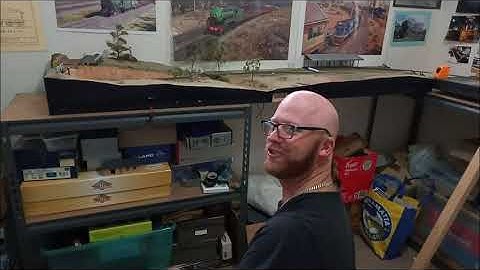 A Photographic Journey of the Building, Moving & Re-homing of a Small Shelf Layout.