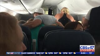 Tim Tebow comforts man on plane in his final moments