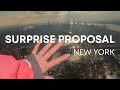 Surprise proposal in new york  snow and open door helicopter