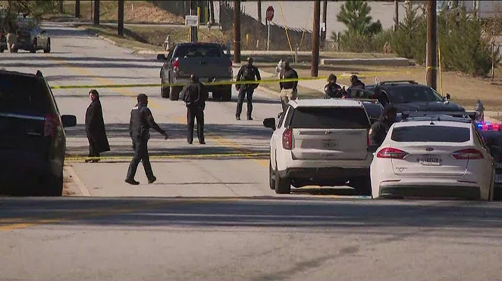 Man shot, killed by officer following altercation in business parking lot