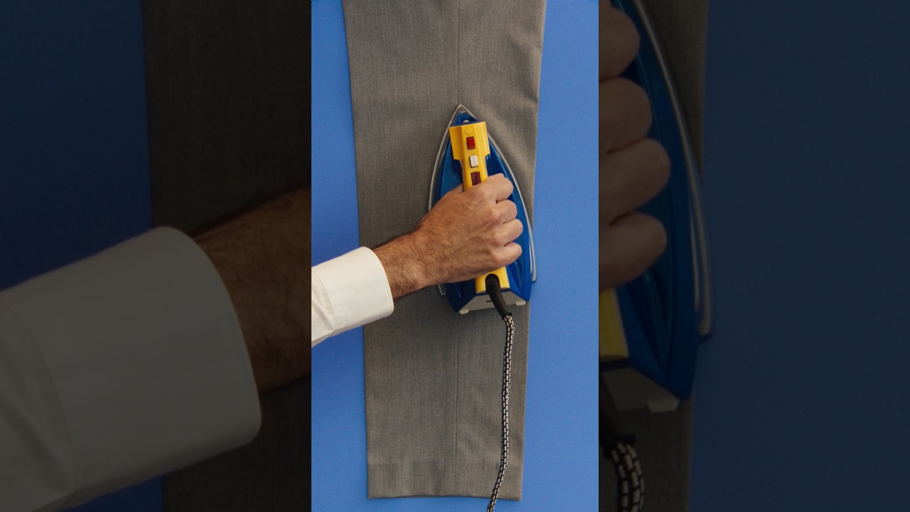Steam the crease, legs aligned, a spritz of spray, iron top to bottom in one pass.