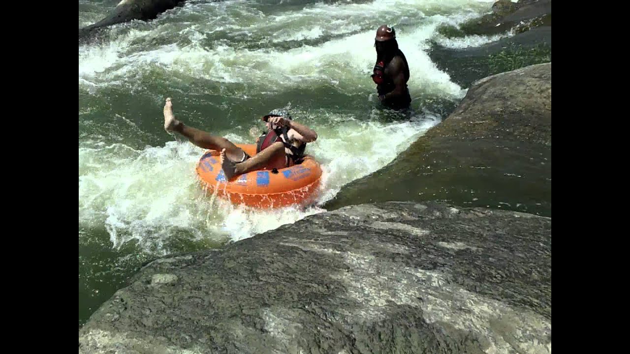 Extreme Tubing Surfing a Tube & 360 Cartweheels in Whitewater Lost