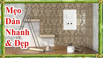cách dán giấy dán tường nhanh và đẹp khi cắt lỗ các ổ điện