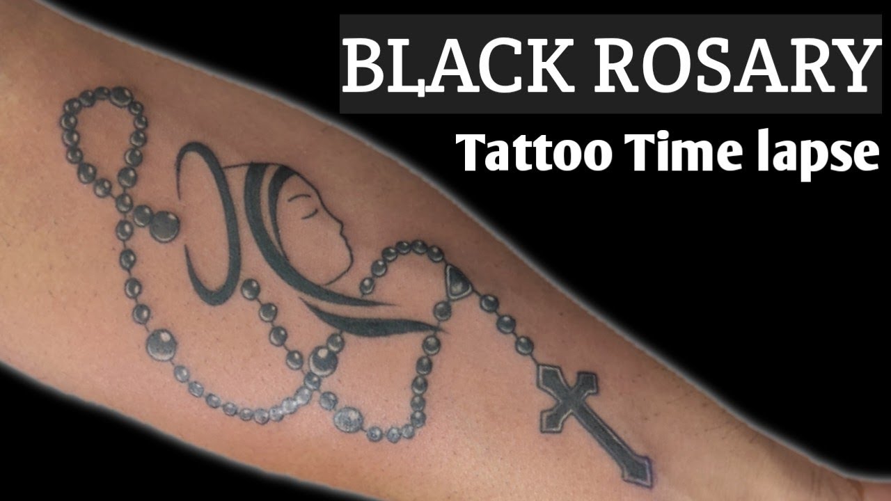 1. The Symbolism of a Rosary Tattoo - wide 8